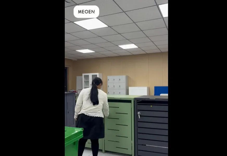 Trash can storage cabinet